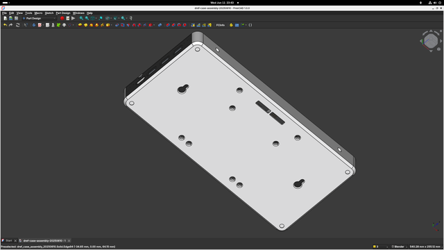 the same item, but viewed from below, displaying 3 sets of mounting holes (incl 2x vesa) and two slots for passing cables through to a potential downstream box (for batteries etc)