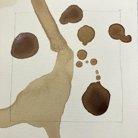 The original tile with a square pencil border and huge blobs of tea stain