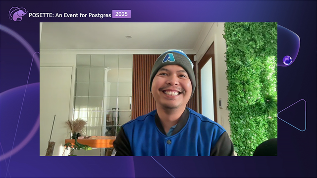 A person sitting in a room. The background features a glass cabinet, some plants, and a door. The top left corner displays the text 'POSETTE: An Event for Postgres 2025' with '2025' highlighted in purple