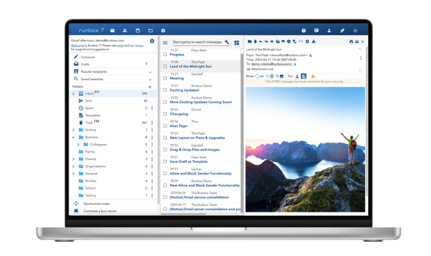 Runbox 7 inbox on laptop with message list and image of the midnight sun and mountains