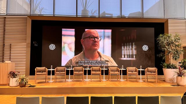 Jony Ive on a screen at OpenAI