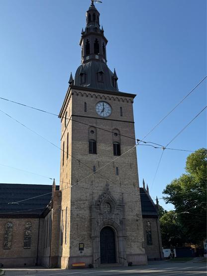 Oslo cathedral with a pride bench out front