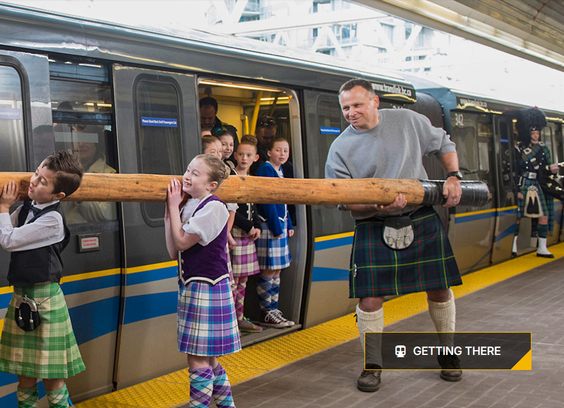 a man and some kids carrying a caber (a large wooden pole) onto a public transit train car.