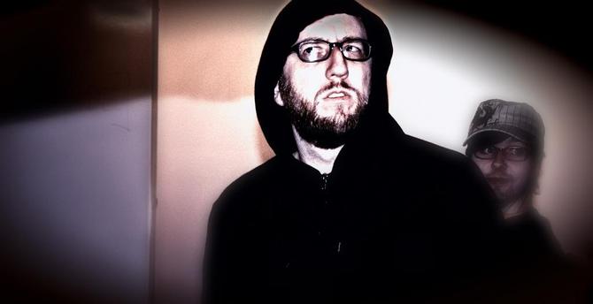 A photo of two hackers.