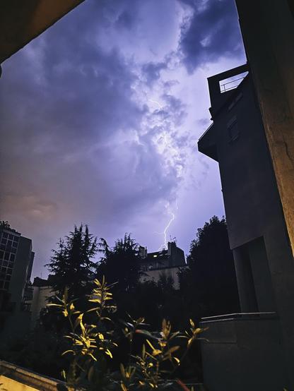 Picture of lighting in a purple-y sky over Paris 