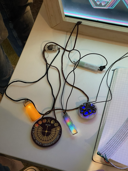 LED pendants on a table designed as glowing crystals