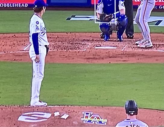 View from behind the mound, logo is on mound to right of Yamamoto. 