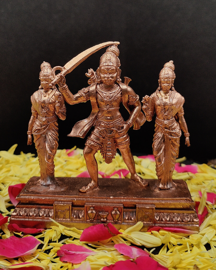 Madurai Veeran idol in a heroic warrior stance, holding a sword and shield, finely crafted in bronze with intricate detailing, symbolizing protection, courage, and Tamil cultural heritage.