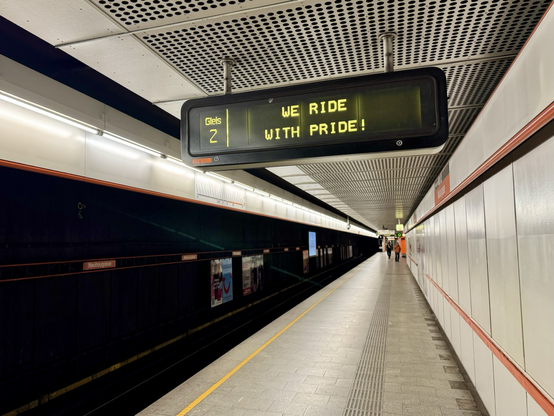 Subway station in Vienna, Austria: The electric signs switch to the welcoming message for the Pride Parade.