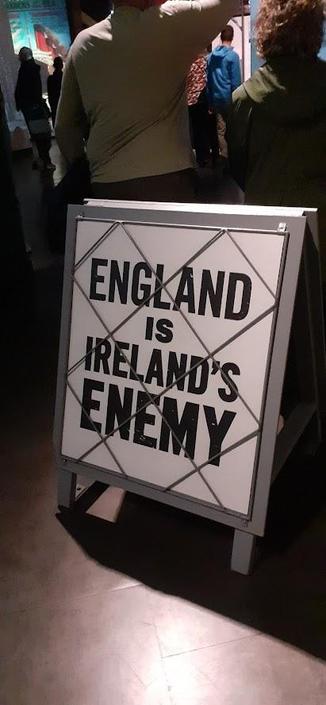 A display item in the Titanic Museum, in the style of an old street newspaper stand, declaring that "England is Ireland's Enemy".