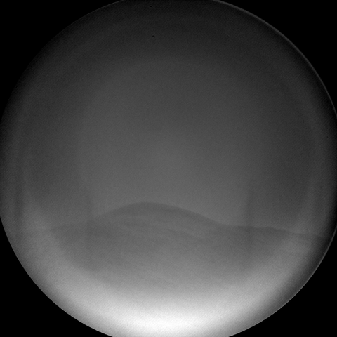A grey scale image capturing a Martian landscape.
