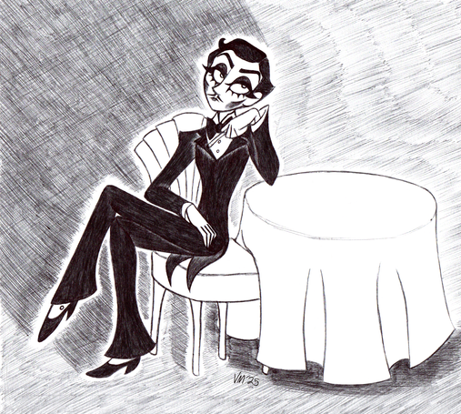Enby Adams dressed stylishly in a tuxedo with makeup accentuating the cheekbones and eyelashes. Hair is short and dark, slicked back save for a snazzy curl over to the right, looking debonair and classy with thin lips and a small mustache.