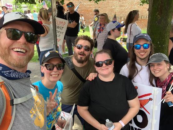 Group photo of our friends at the end of the march beginning of Pride.