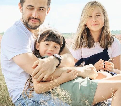 Mother and Father with thier daughter 