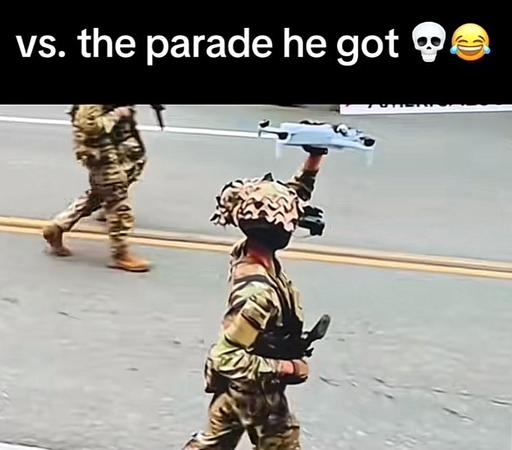 Soldier carry’s commercial drone lime its toy. Looms like the us military knew the parade was a stupid idea