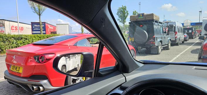 Cueing at P&O Ferries in Europort, with a nice view on a red Ferrari and a Land Rover 110 TD5