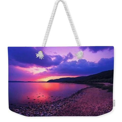 Beautiful purple sunset sky over Canyon Lake in Texas
