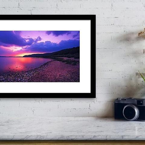 Beautiful purple sunset sky over Canyon Lake in Texas
