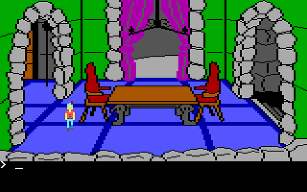 A fake screenshot of Dracula's dining room in King's Quest 2, mimicking the design seen on the box. The walls are green, the candelabra is unlit, and the dining table has a brown top and dark gray legs. Additionally, the parser window at the bottom of the screen has been raised up and slightly rearranged, and the white score bar at the top of the screen has been removed, to match the GUI as it appeared in the original PC booter release of the game.