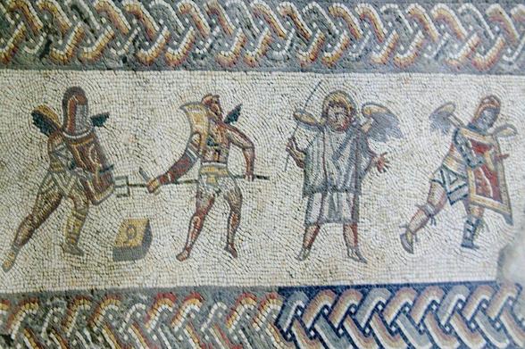 Gladiators fighting in the mosaic