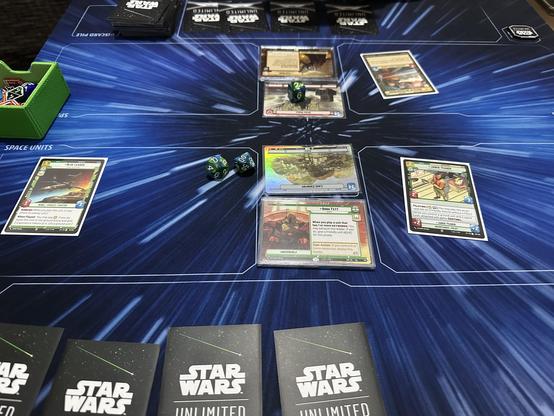 Playmat with a Star Wars Unlimited TCG game in progress. 