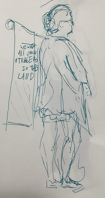 A green  pen sketch of a person holding a flag that says “we were all once strangers in this land”