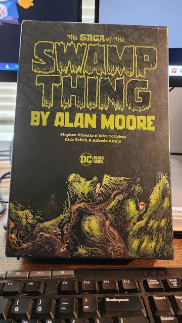 6-volume collection of Alan Moore's "Saga of The Swamp Thing" with theart of Stephen Bissette, John Totleben, Rick Veitch, and Alfredo Alcala.