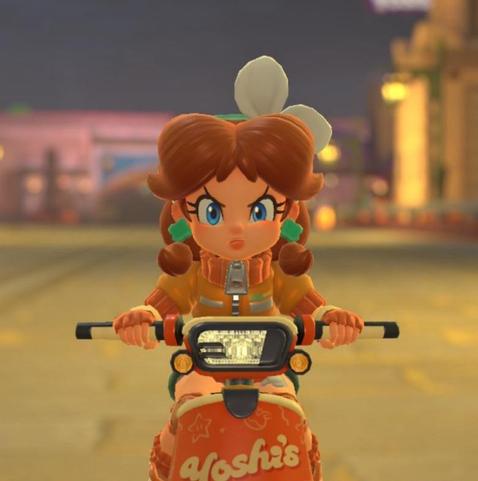 Princess Daisy riding a scooter in Mario Kart World doing the infamous “Luigi Death Stare”
