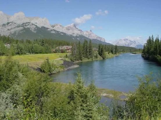 Image: View from Canmore, Alberta of Rundle Mountain, looking over Bow River toward Banff National Park.