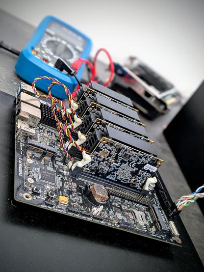 Four turingpi rk1 nodes mounted and ready for testing work.