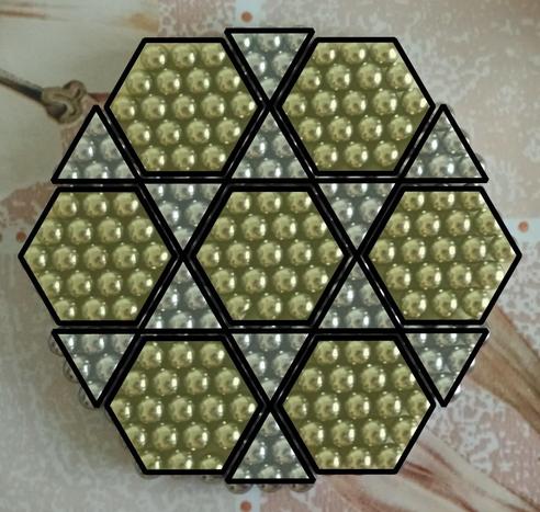 Last picture, this time overlaid with semi-transparent triangles and hexagons that highlight each of the groups of magnets.
