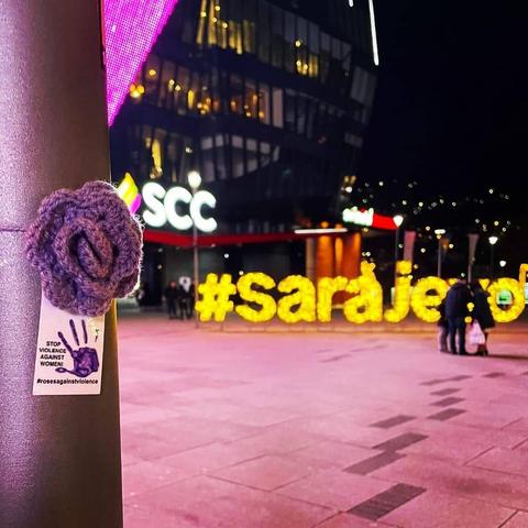 a purple knittet rose on a square in Sarajevo, Bosnia