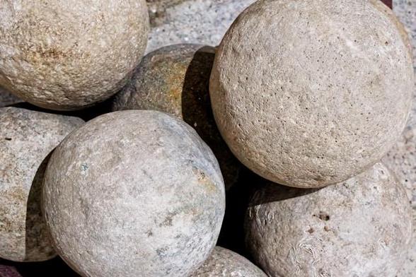A pile of round stones lying next to each other - Image from Eric Prouzet at Unsplash