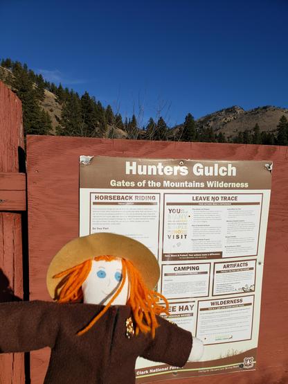 Ranger Sarah reads the Hunters Gulch Trail information for her hike in to the Gates of the Mountains Wilderness Area.
— at Helena-Lewis and Clark National Forest.
