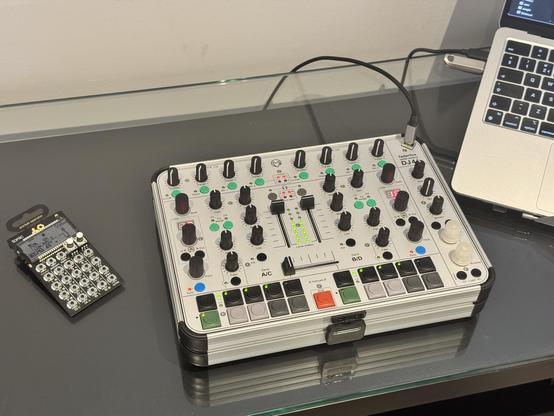 A FaderFox DJ44 MIDI DJ controller, with a Teenage Engineering Pocket Operator for scale.