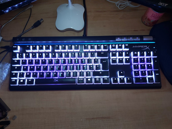 My new backlight-enabled mechanical keyboard, viewed from top, after some mild RGB LED software tweaking. And yes, the desk is cleaner too !