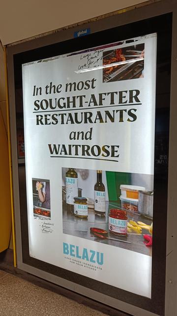 An advert bearing the headline "In the most sought-after restaurants and Waitrose".

There are scribbles in places and odd underlined words. It feels a Hodge podge of design as if you're supposed to take note of what doesn't fit. Well, if you're a Blue Prince addict, that is.