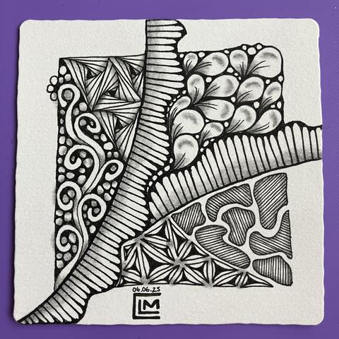 Finished tile with black ink patterns and graphite shading