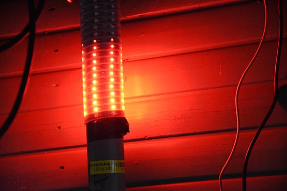 A lamp showing an alerting red color. The lamp is borrowed from EventInfra.
