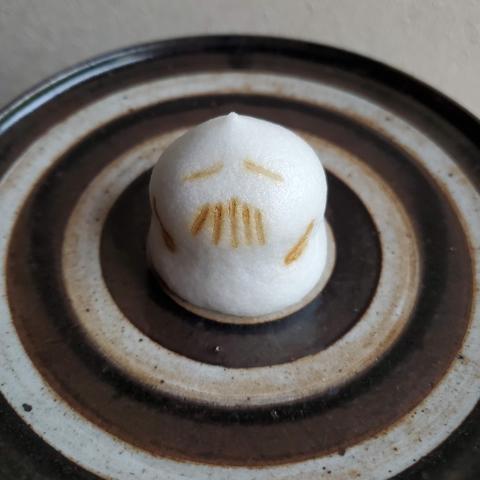 Kagizen Yoshifusa produced 'Tameiki-chan', a pointy-headed, rather melancholy-looking sweet, for an art exhibition.