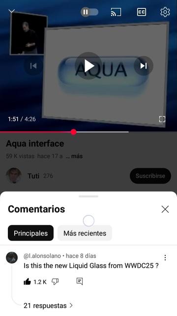 The image shows a video player interface on a mobile device. The video is titled "Aqua interface" and has 59,000 views, posted 17 years ago. The video is currently at 1:51 out of 4:26. The video thumbnail displays the word "AQUA" in a blue, water-like font. Below the video, there is a comment section with the option to view "Principales" (Main) or "Más recientes" (Most recent) comments. The first comment, by a user named "[@]l.alonsolano," asks, "Is this the new Liquid Glass from WWDC25?" The comment has received 1.2K likes and 21 responses. The user "Tuti" has 276 subscribers. The interface includes typical video player controls such as play, pause, and volume icons, as well as a "Suscribirse" (Subscribe) button.