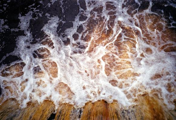 View from above of the turbulent flow of the river.