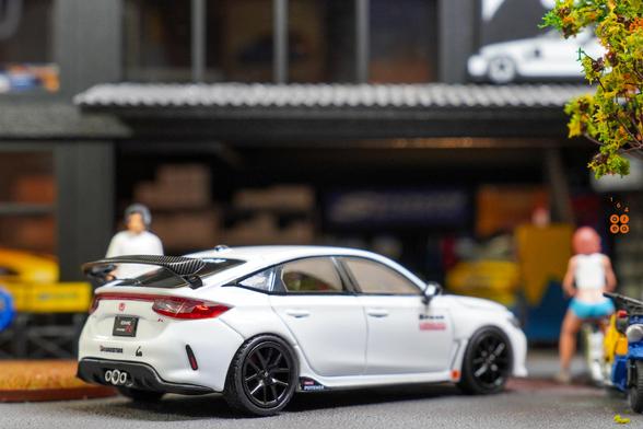 A right side of Honda Civic Type R (FL5), Spoon Sports Livery on White by Motor Helix in 1:64 scale with 1:64 figure on AREA 164