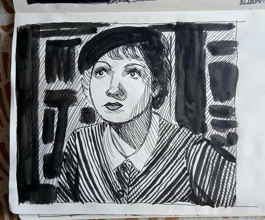 Carnet avec un croquis de Claudette Colbert