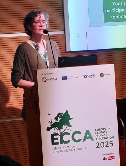 Researcher at the lectern