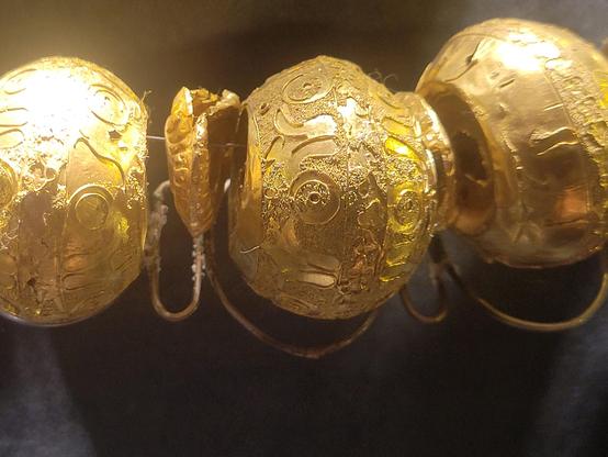 Gold set of earrings, necklace and foil diadem, displaying high level of craftmanship. 