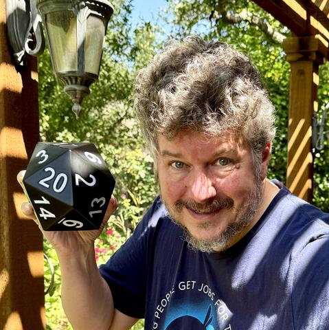 Deranged picture of myself with a giant d20.