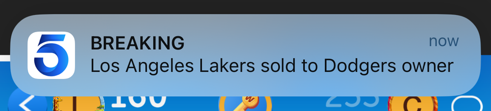 News alert saying the Los Angeles Lakers were sold to the Los Angeles Dodgers owner