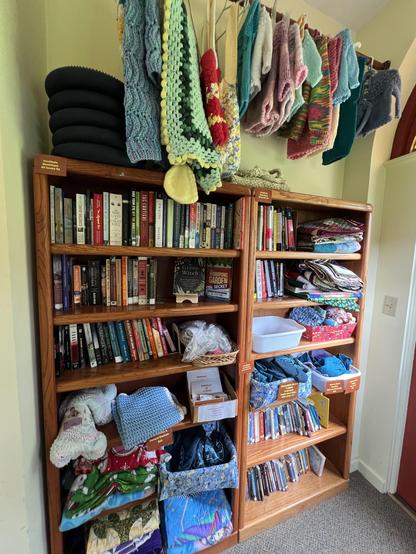 in a nook off to one side, “friends of the library” sell books for very low prices, but also homemade quilts and crocheted or knitted pieces for babies and toddlers. I’ve never seen that before in a library. 