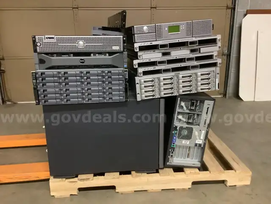 pile of computers on a pallet